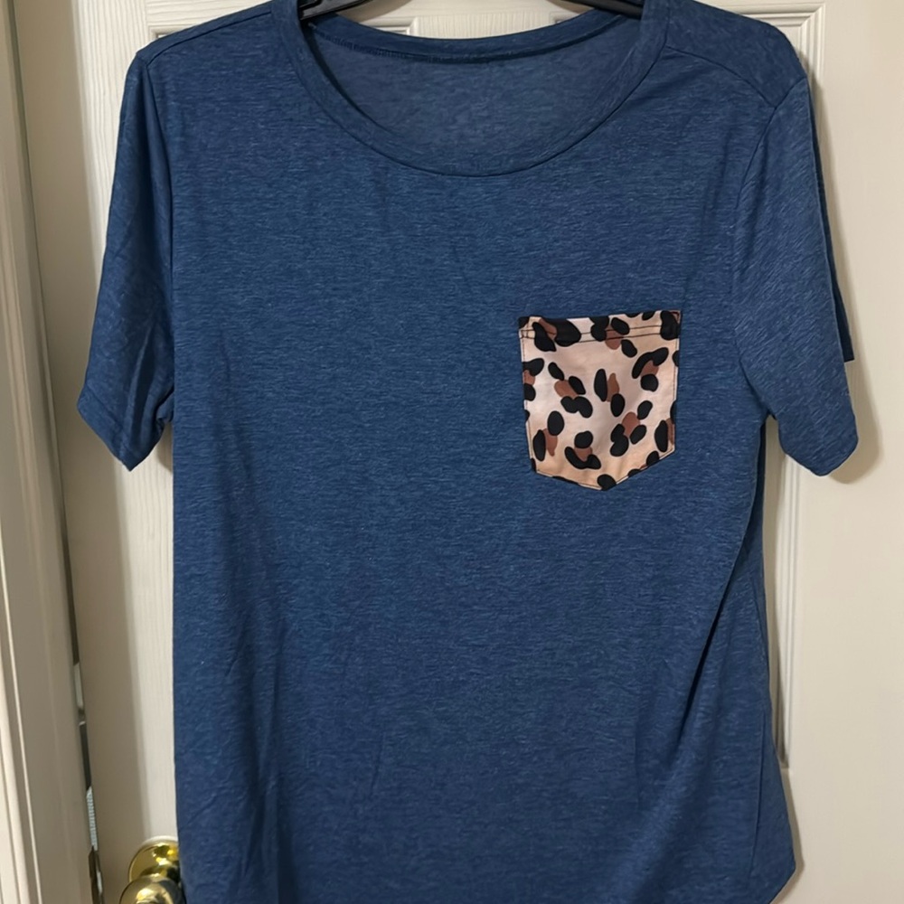 Top with leopard skin pocket